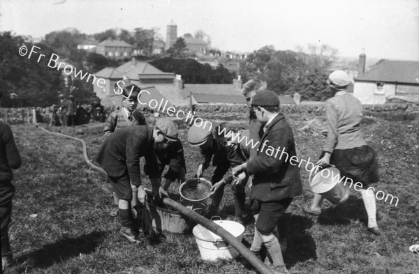 THE PRESBYBERY :SCHOOLBOYS TO THE FORE - FILLING BUCKETS FROM THE LEAKING HOSE